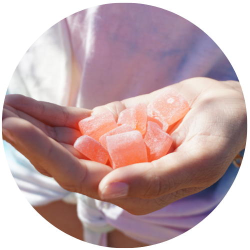 A photo of a person holding CBD candy