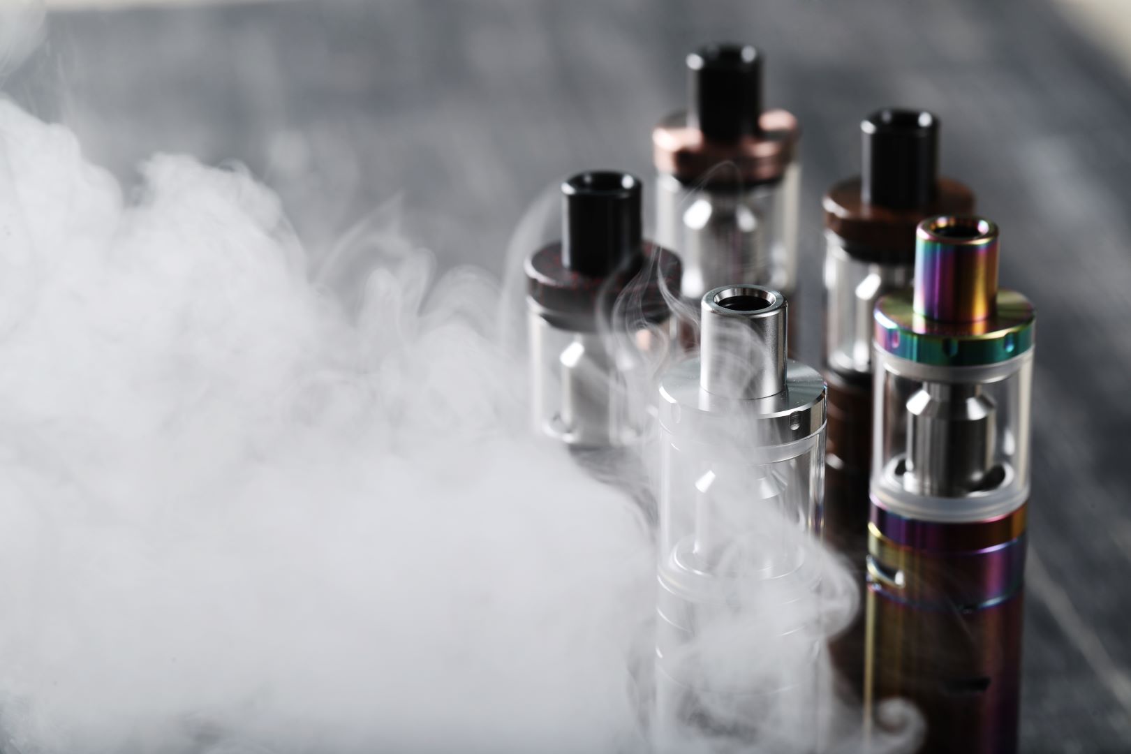 A photo of a vaping device on the wooden table